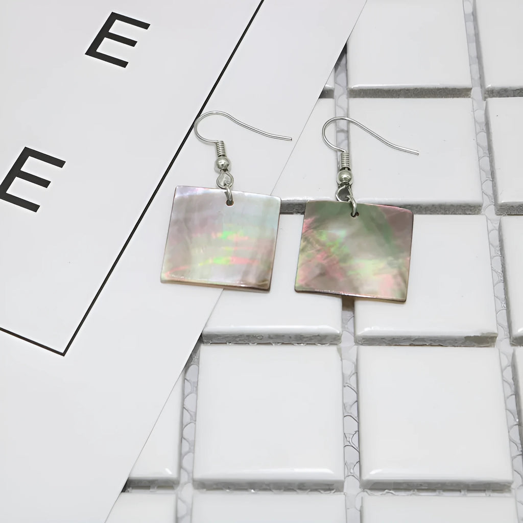 Women's geometric shell earrings in square panther or rectangular shell designs with natural material