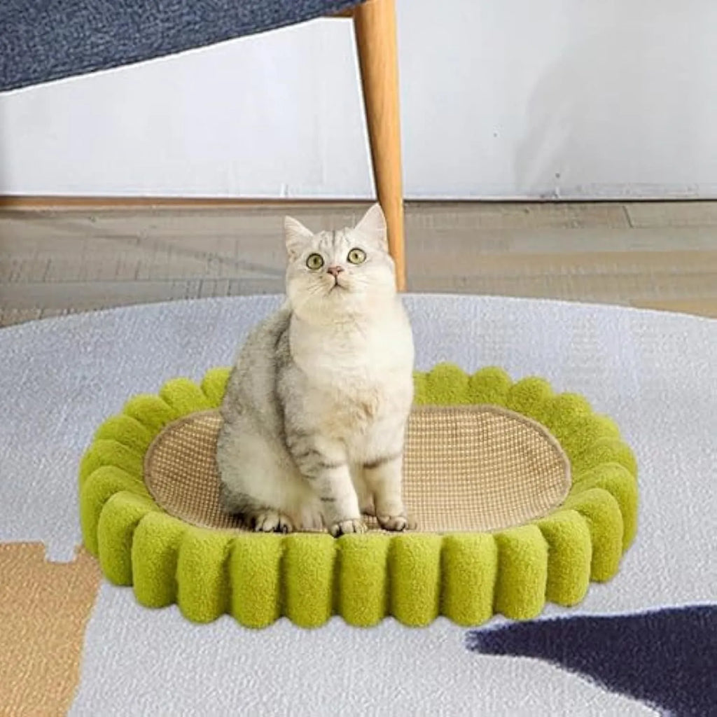 Green oval cat scratching pad and bed made from sisal material