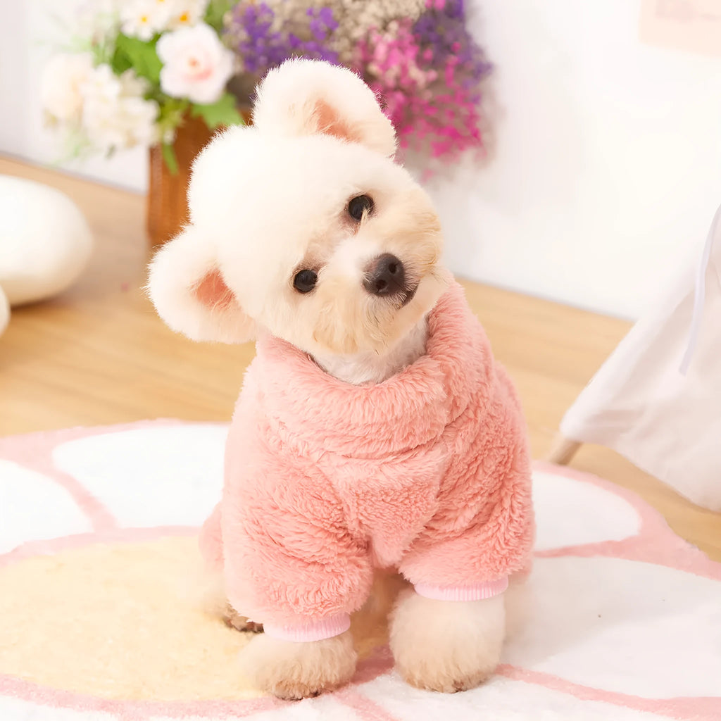 Khaki four-legged dog coat with high collar and plush fleece, shown with a towing ring on the back.