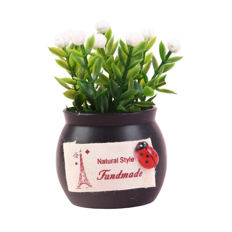 Auspicious fruit potted plant car ornament in a plastic vase, available in black or white, for car interior decoration and odour removal