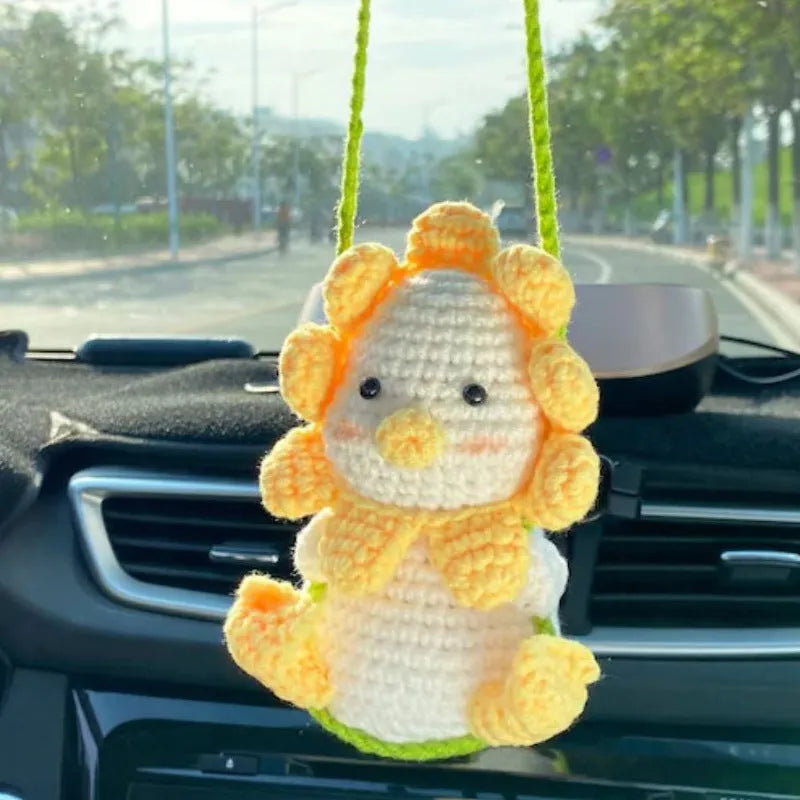 Green and white knitted car plant ornament with hanging rope for dashboard or mirror decoration
