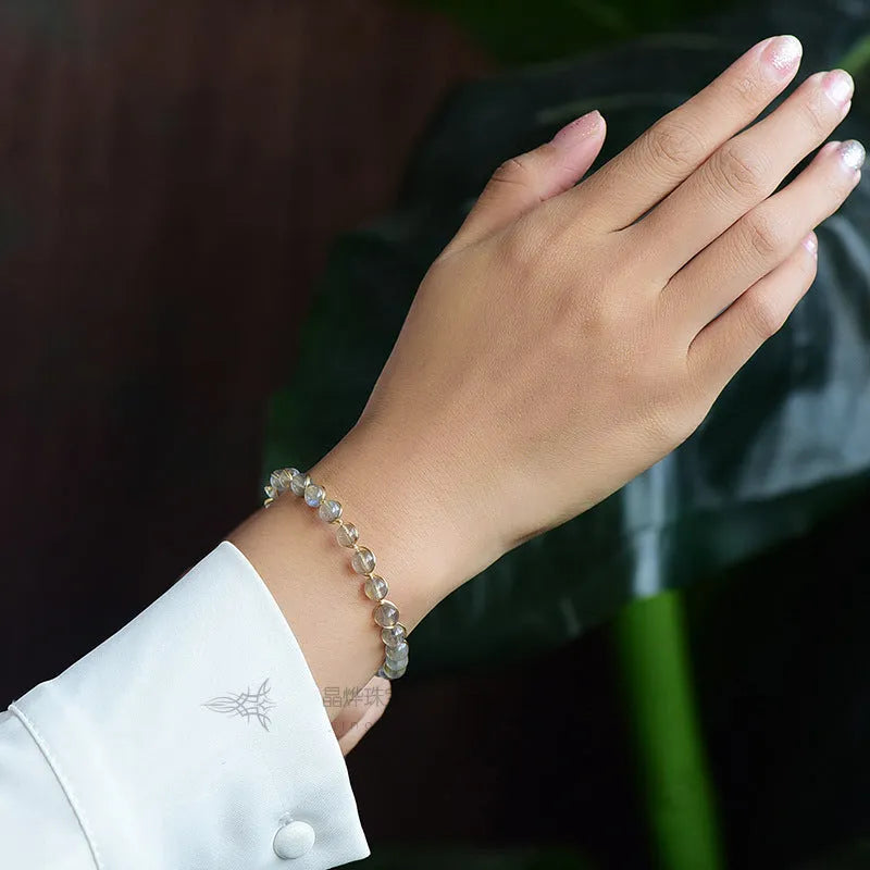 Crystal blue moonstone women's bracelet with 6mm natural stones and 14K gold-plated accents