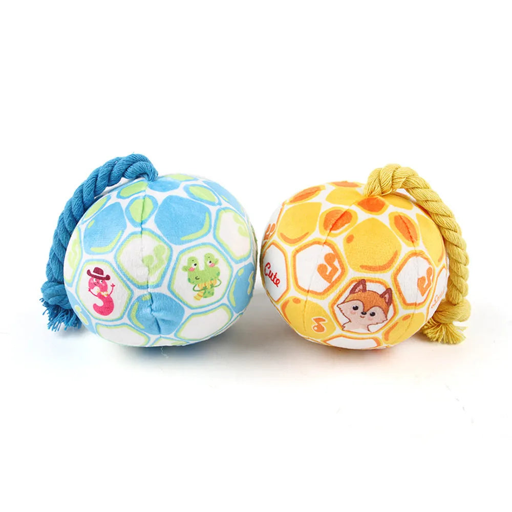Blue and yellow elastic football dog toy with cotton rope for tug-of-war and chewing.
