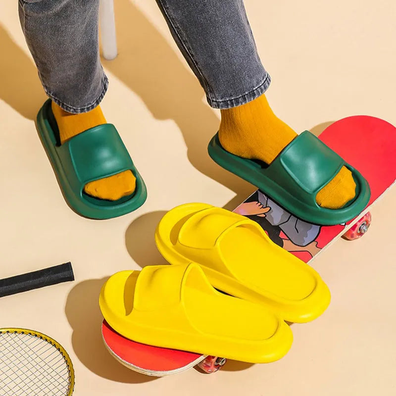 A pair of soft EVA bathroom slippers with a thick, non-slip sole, shown in a choice of colours.