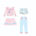 Girl's gilded mermaid swimsuit set with top, skirt, trousers, and shorts in various colours.