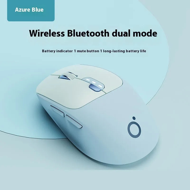 A mute wireless Bluetooth mouse in Matcha Green colour on a desk, showing its compact size and five-button layout.