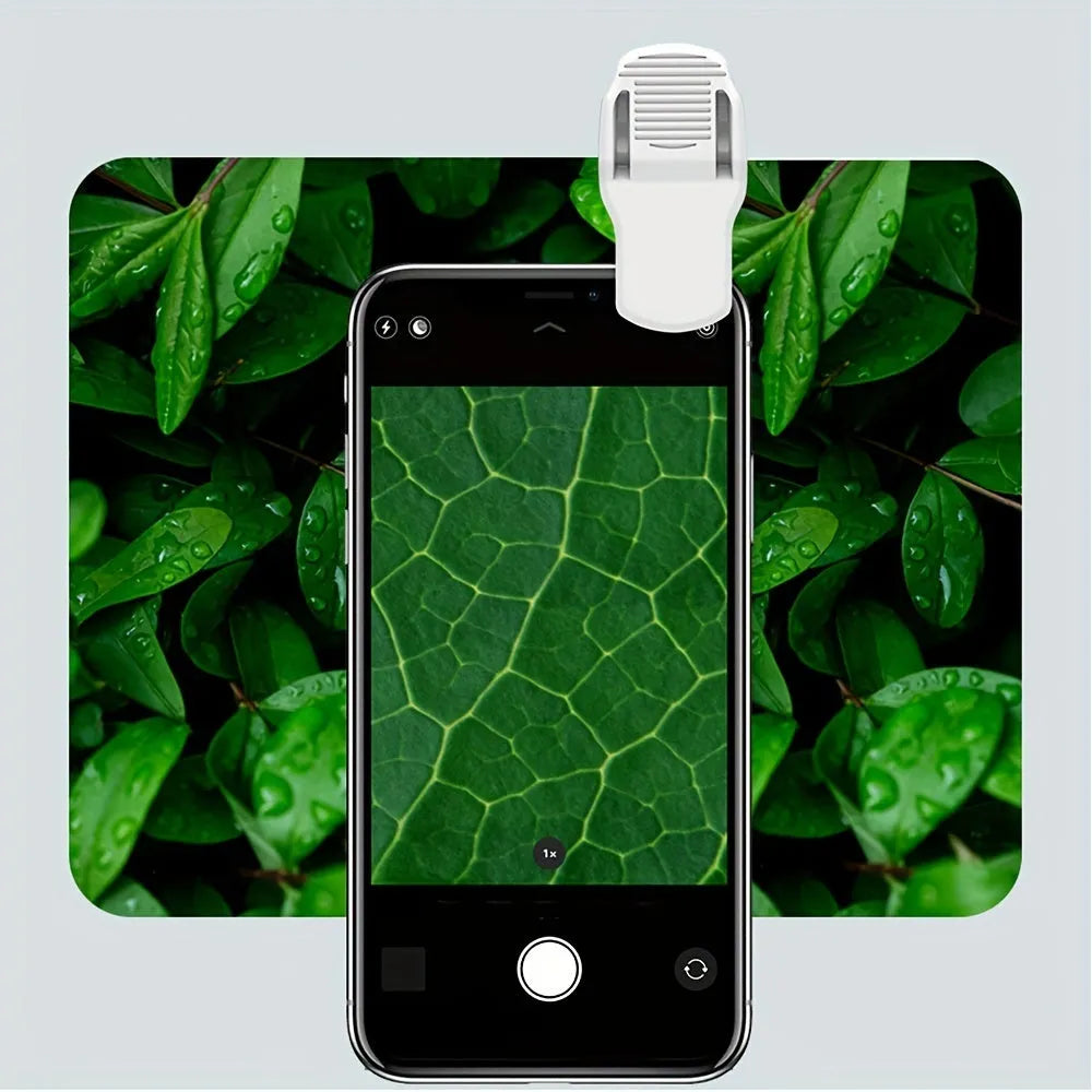 Pocket microscope with detachable clip for smartphone cameras showing 60x magnification and LED light