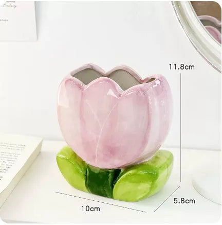 Ceramic flower pen holder storage box in floral pattern colours on desktop