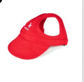 Canvas pet baseball cap for dogs and cats with adjustable buckle and Velcro, shown in black, blue, pink, and red