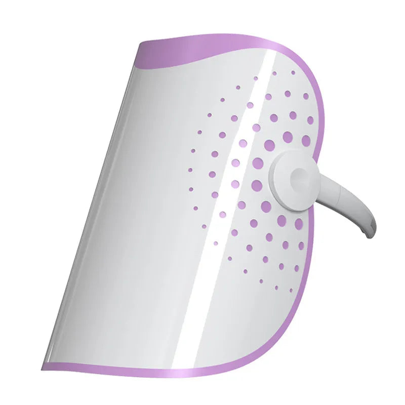 White and purple photon IPL beauty mask facial device on a flat surface