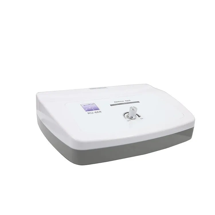 White professional spot removal pen for beauty salons with multiple power adapter compatibility