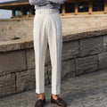 Slim fit straight leg suit trousers in a chemical fibre blend fabric for formal wear.