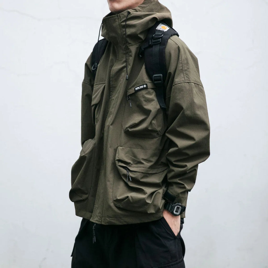 Men's loose hooded windproof jacket with three-dimensional side seam pockets in black, yellow, or green, sizes M to XXXL