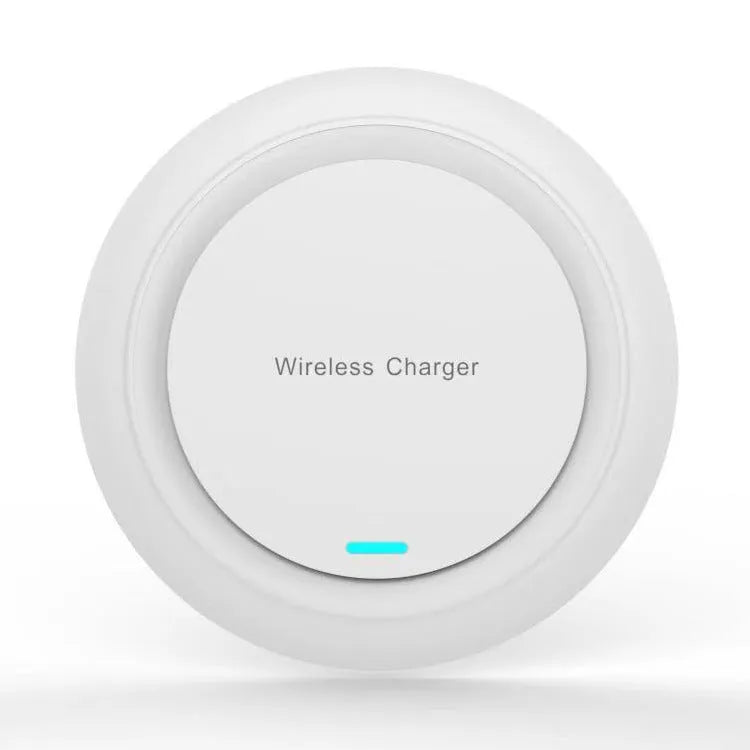 Round white desktop wireless charger with USB cable showing 10W fast charging for mobile phones