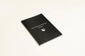 Black hardcover dream journal notebook with a business simplicity design for recording dreams.