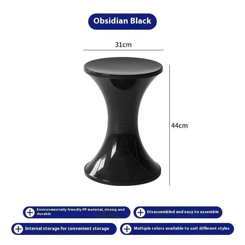 Hourglass-shaped plastic shoe changing stool in a choice of five colours: black, green, red, white, brown.