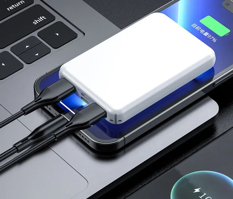 Black and white universal power bank for electric heating vests, showing compact size