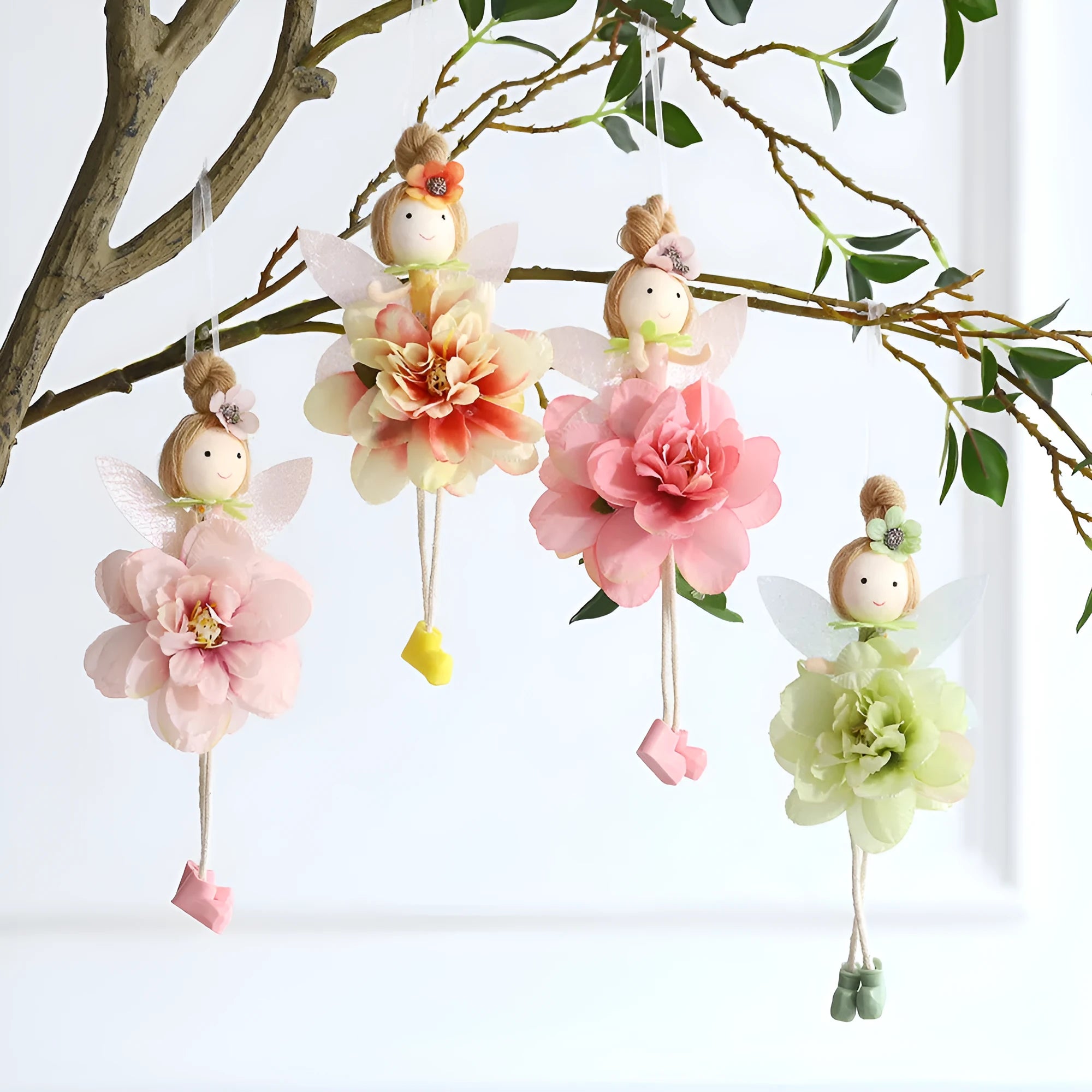 Cloth elf Easter pendant with floral and angel girl motif in pink, green, or yellow.