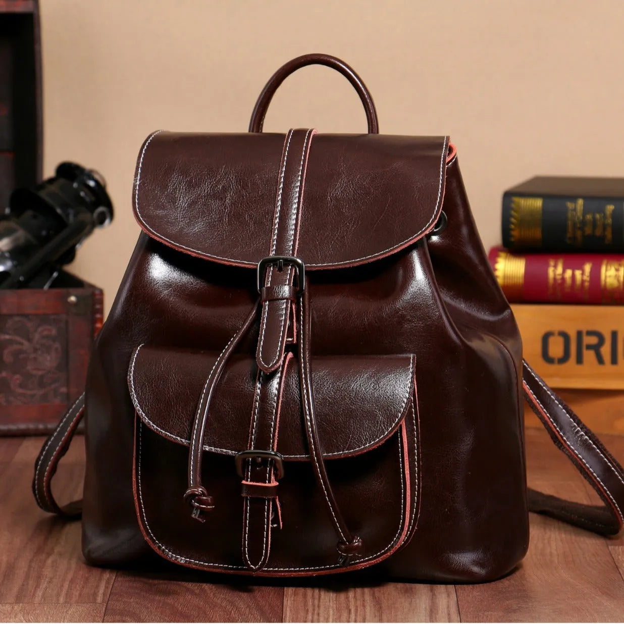 Genuine leather Korean-style backpack with cowhide pocket and pull-belt in Black, 28x30x12cm
