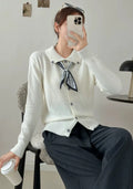 Lapel scarf sweater cardigan in acrylic fibre with long sleeves and splicing detail.