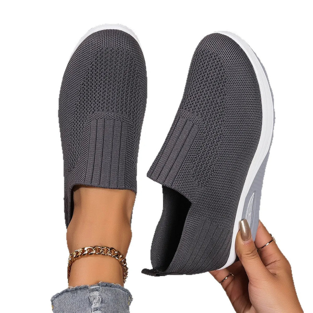 Slip-on casual women's shoes in beige with knitted upper, low top wedge heel, and round toe