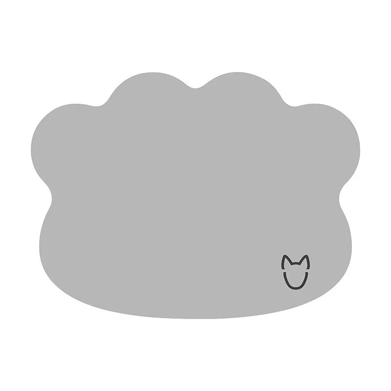Ice silk dog cooling mat with dog head print, shown in light grey on a wooden floor.