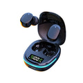 Black true wireless Bluetooth in-ear headphones placed inside their magnetic charging case.