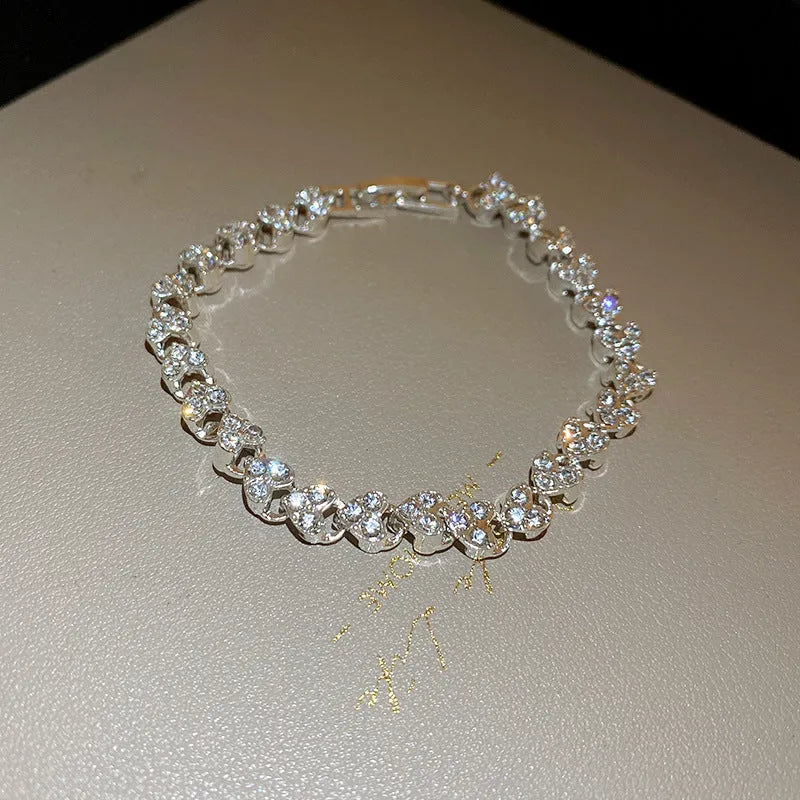 Silver heart bracelet for women with inlaid zircon and love heart charm, fashion OL style