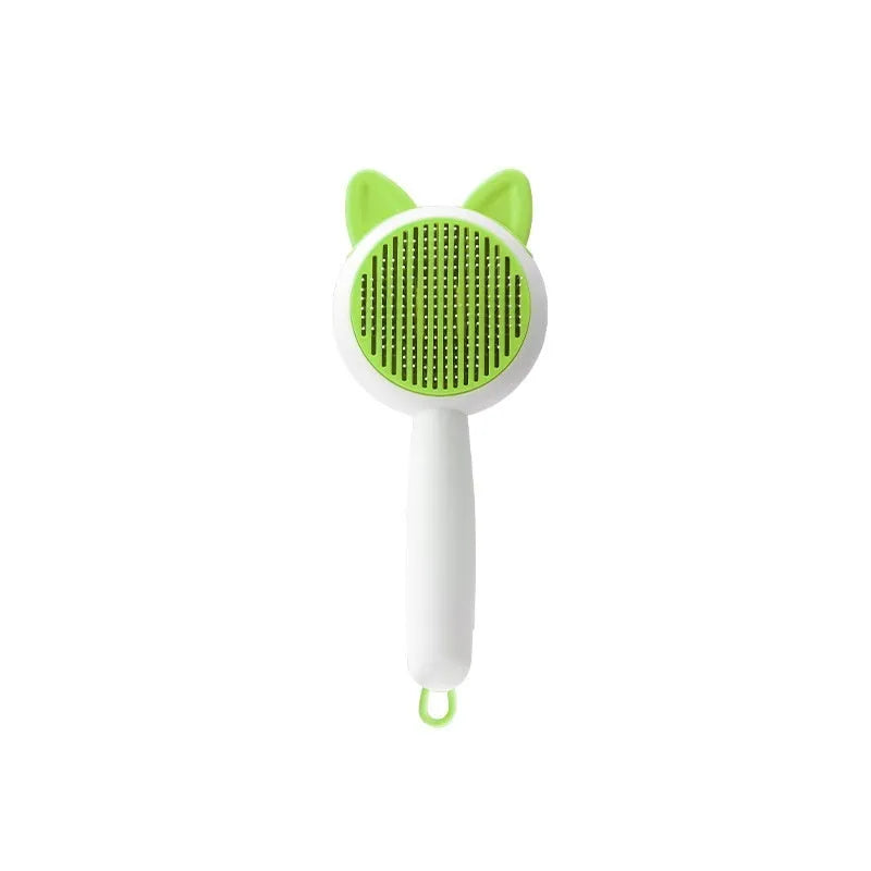Greenish white and orange white self-cleaning cat comb with stainless steel bristles for pet hair removal.