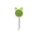 Greenish white and orange white self-cleaning cat comb with stainless steel bristles for pet hair removal.