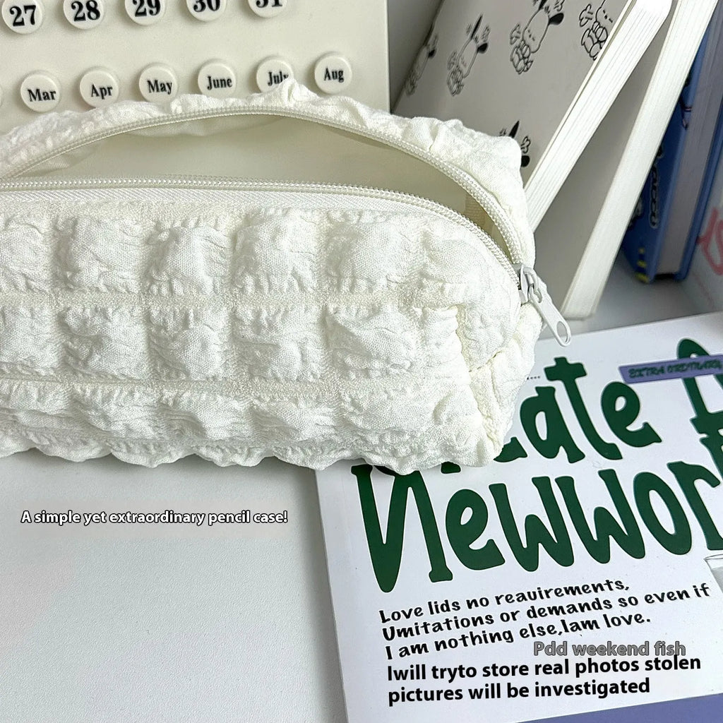 Cream puff design polyester pencil case in beige colour with zip closure