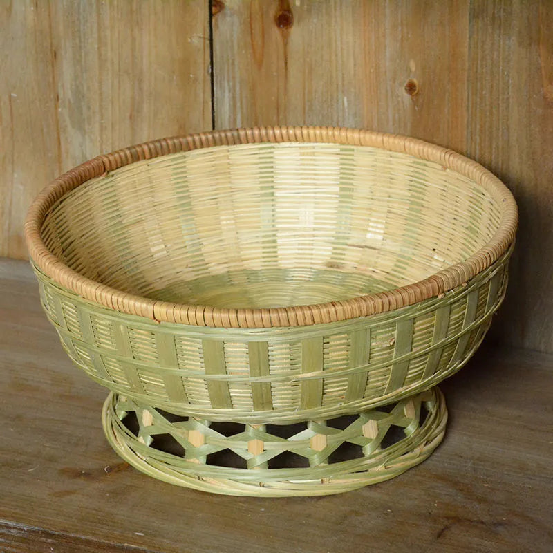 Handmade woven bamboo storage basket in natural colour showing three size variations