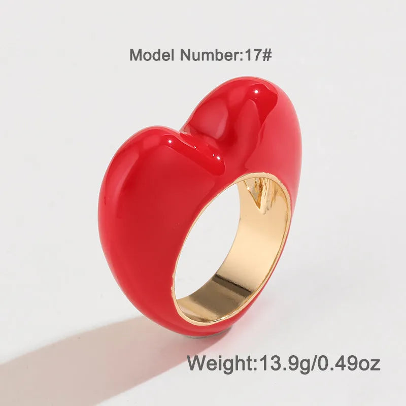 Heart-shaped zinc alloy ring with raised three-dimensional enamel colour design in love theme.