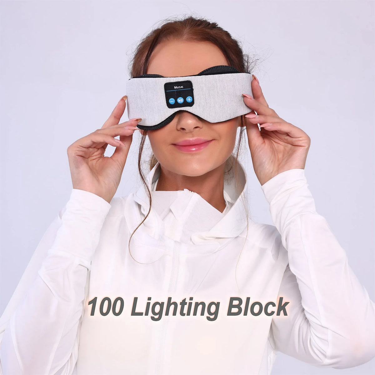 Grey polyester Bluetooth sleeping eye mask with long eyelashes design and no pressure fit.