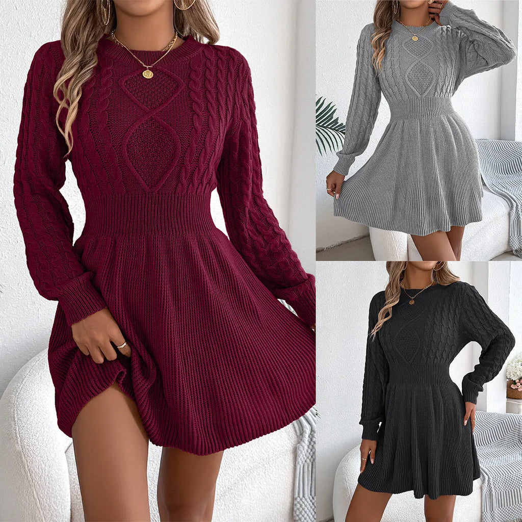 A solid colour long sleeve sweater dress with lantern sleeves and an elastic waist, shown in black.