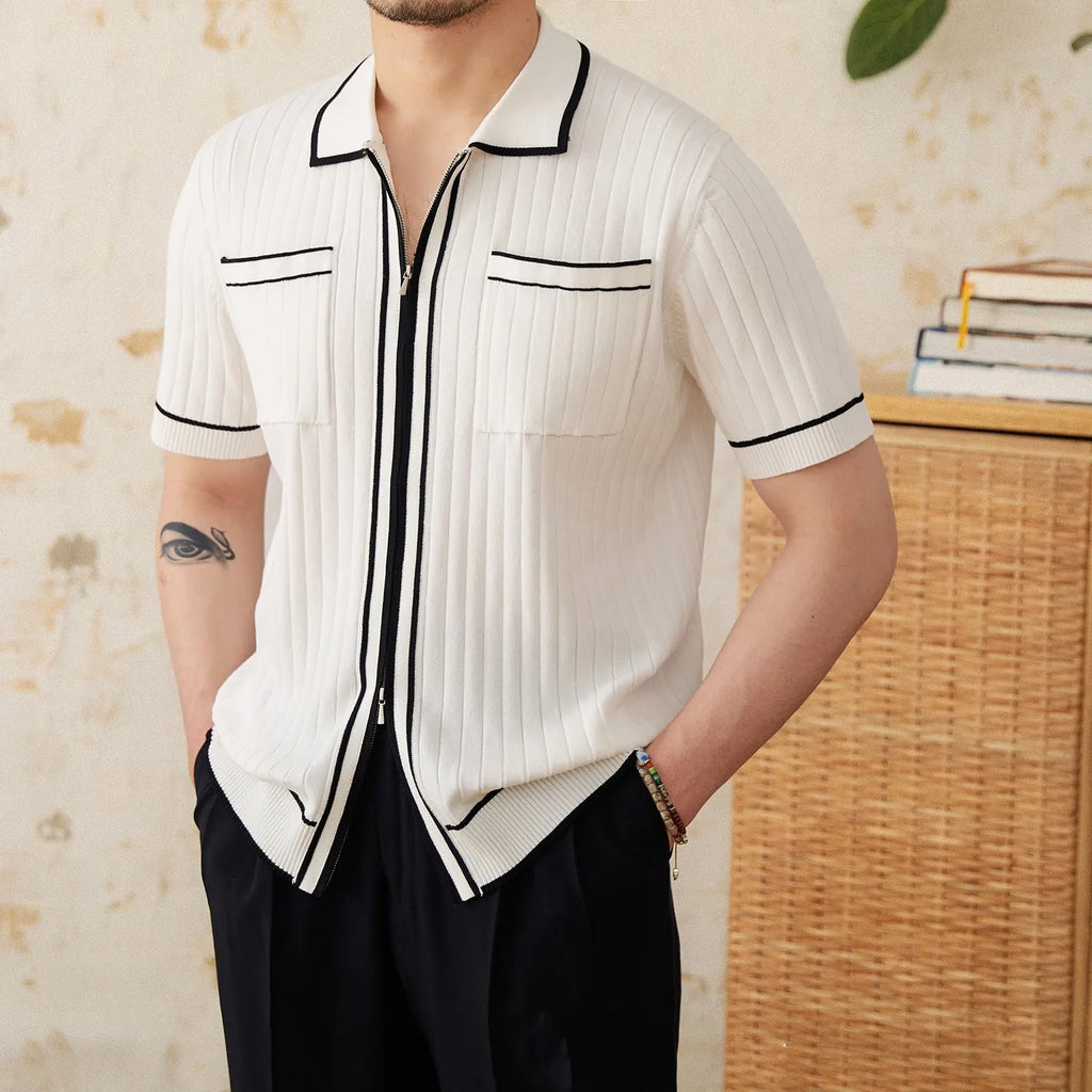 Slim black lapel collar short-sleeved polo shirt made from a thin viscose blend fabric.