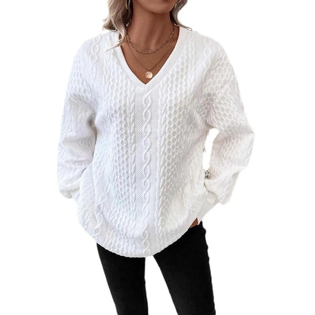 Milky white loose fit long sleeve T-shirt with a raised 3D pattern on the front.