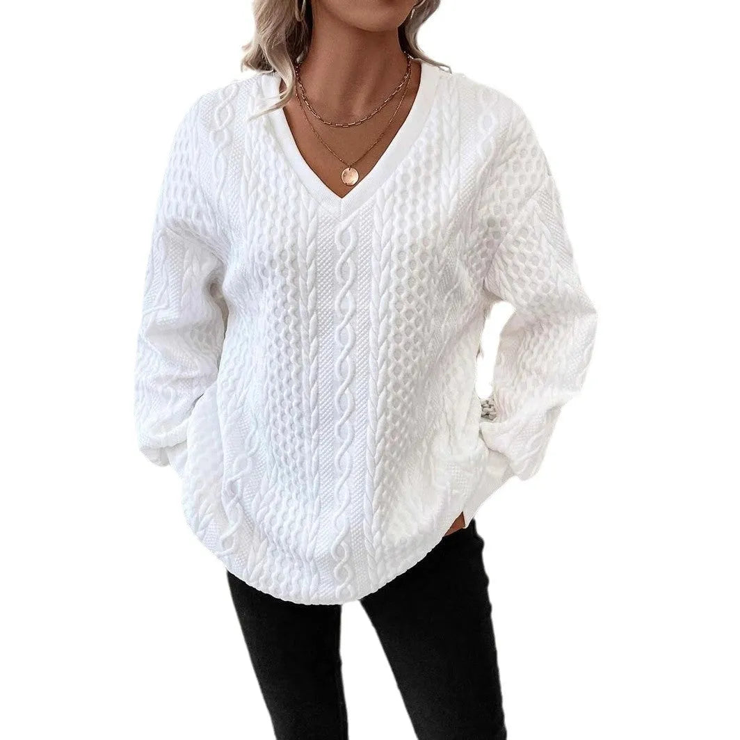Milky white loose fit long sleeve T-shirt with a raised 3D pattern on the front.