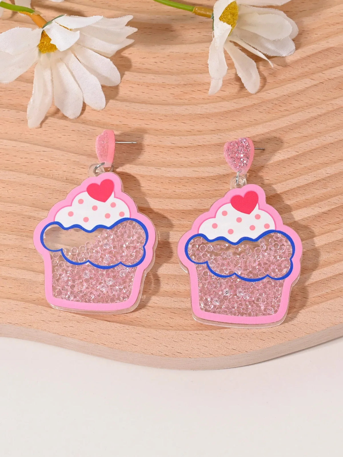Colourful acrylic stud earrings with cherry, strawberry, watermelon, pineapple, coconut, cake, and ice cream designs.