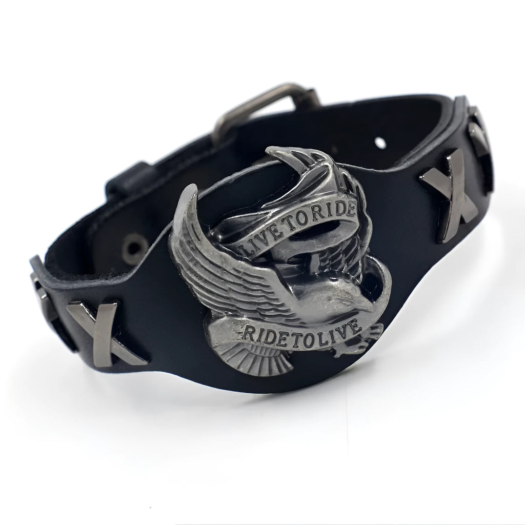 Black geometric bracelet with eagle watch-button closure on leather strap showing adjustable width design
