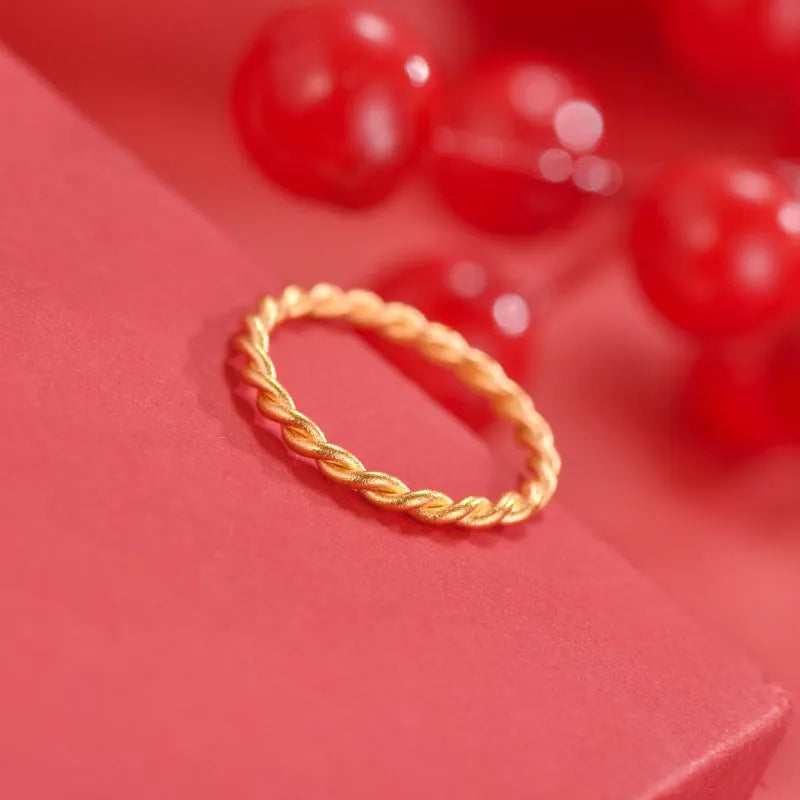 Gold plated brass women's ring in bracelet, twist, matte, and glossy styles showing UK size options.