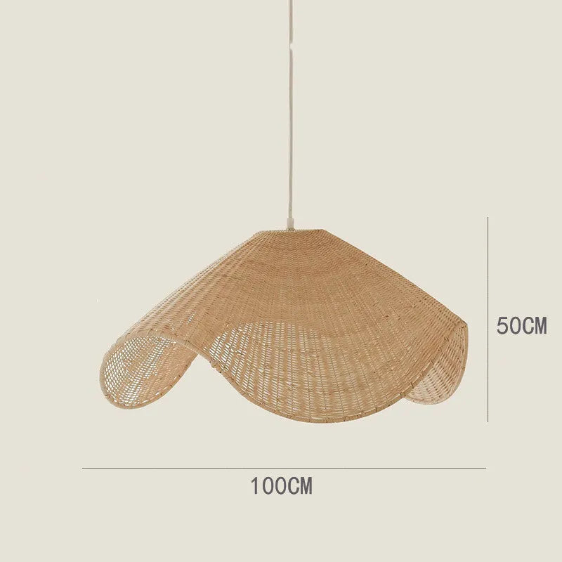 Handmade bamboo and rattan pendant ceiling lamp with a woven willow shade in warm white light.