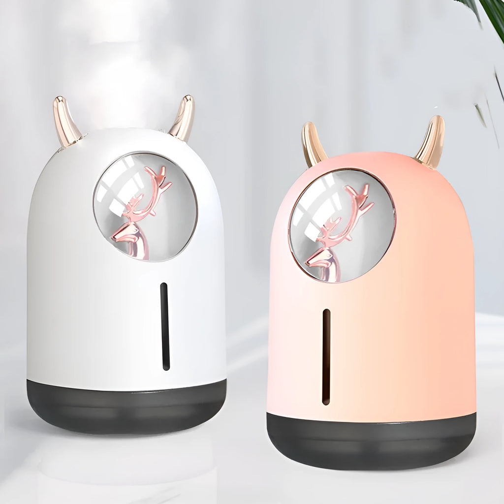 Mini animal-shaped USB aroma diffuser humidifier in white or pink with single mist outlet for small spaces