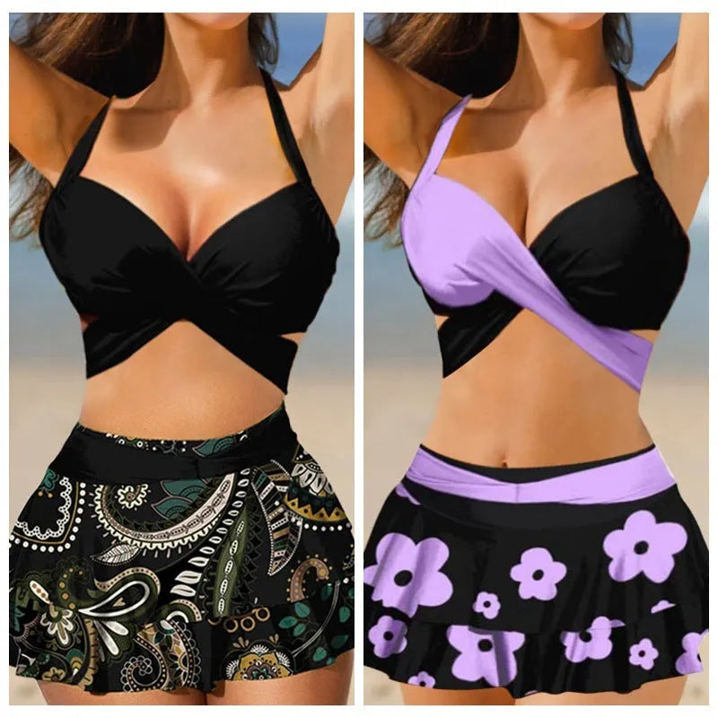 Women's black bikini set with lace-up detail and matching split skirt laid flat.