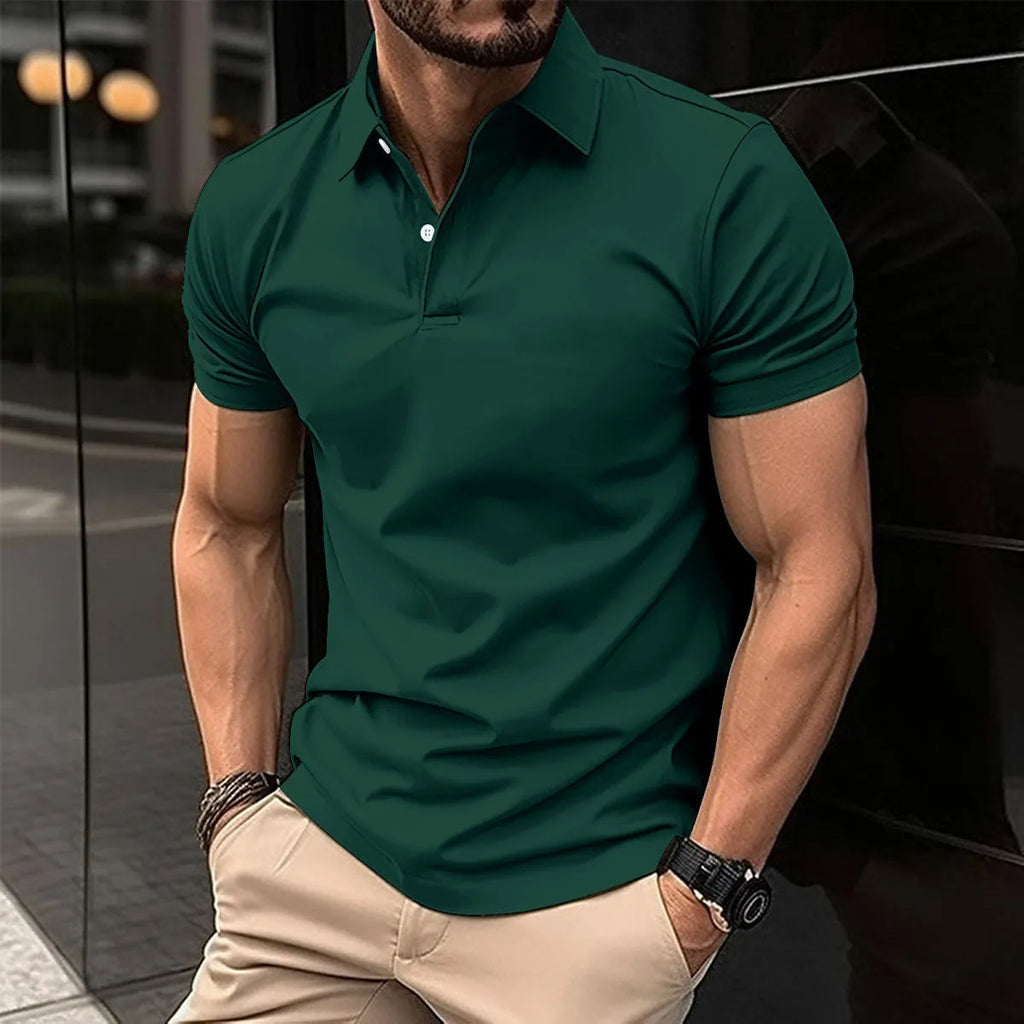 Man wearing a solid colour short sleeve polo shirt with a button-down lapel.