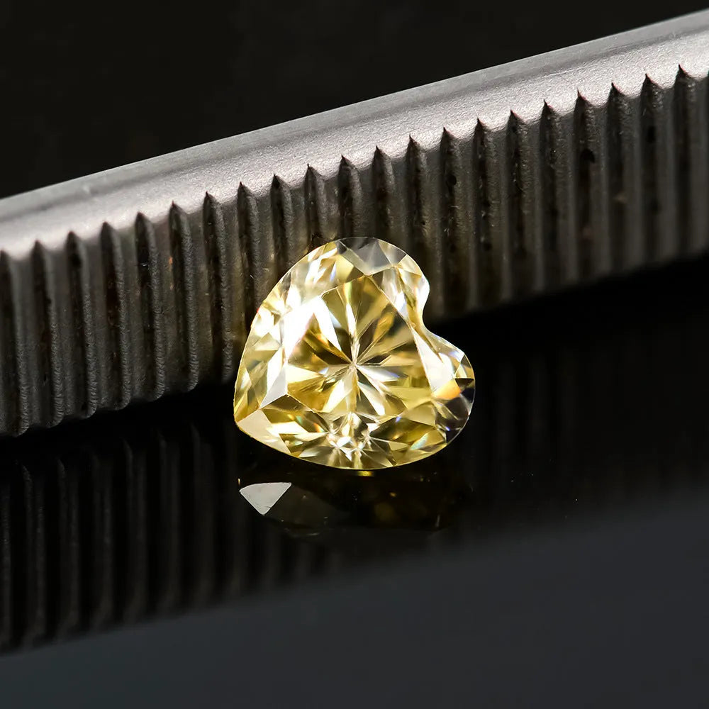 Lemon yellow heart-shaped moissanite gemstone measuring 5x5mm for jewellery making