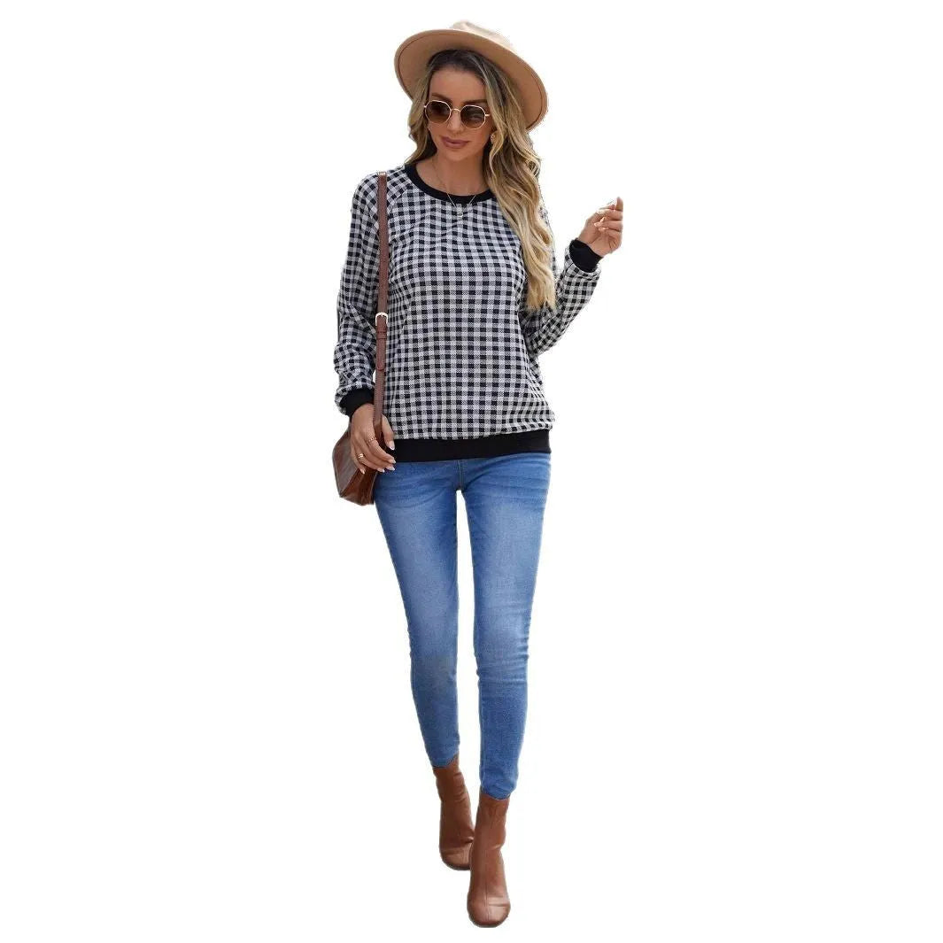Black men's long sleeve sweater with a striped plaid print pattern.