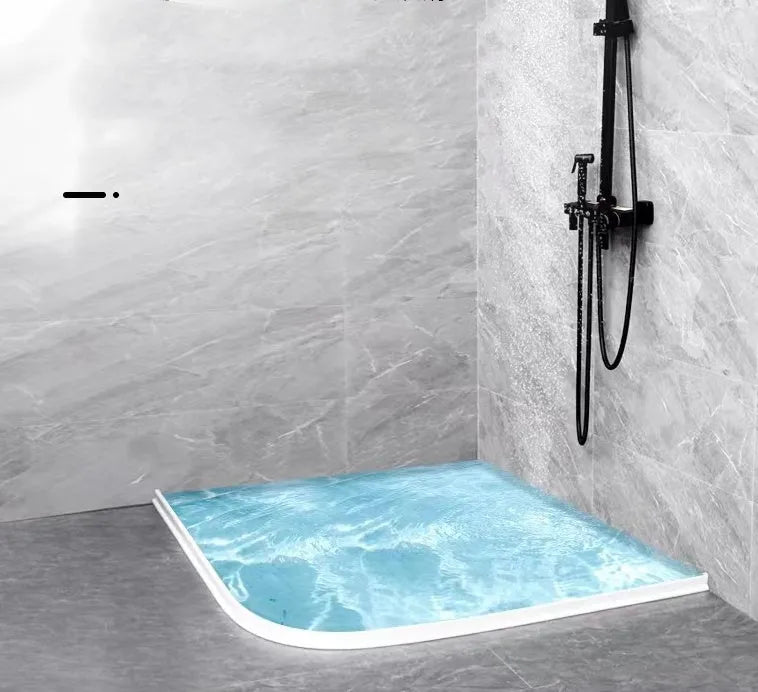 Flexible black TPE silicone water blocking strip for bathroom shower floor.