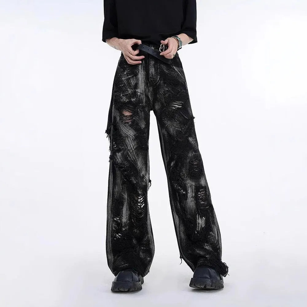 Men's heavyweight washed denim jeans in American high street style with graffiti detailing