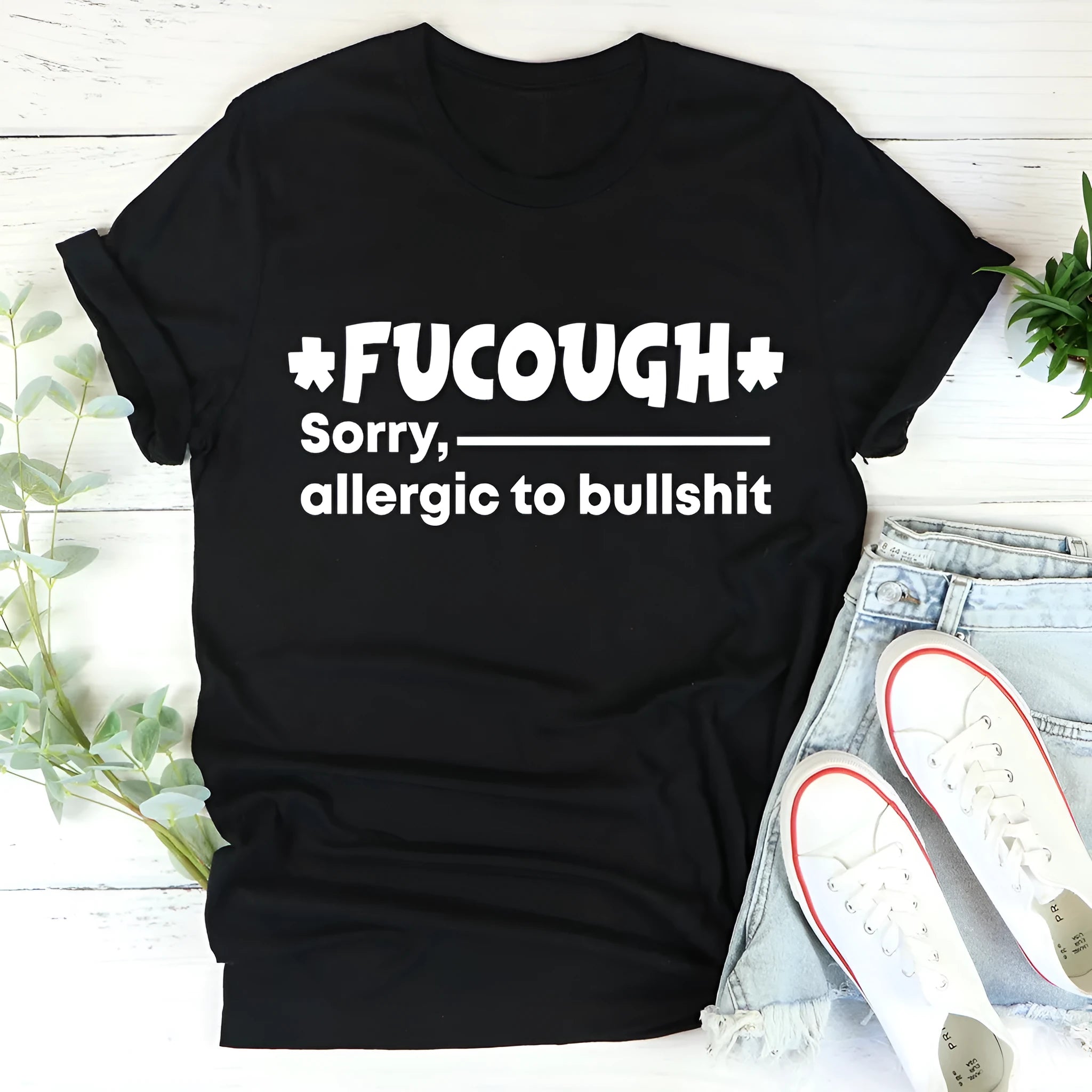 Black loose fit cotton short sleeve T-shirt on a hanger